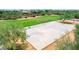 Aerial view of the community basketball court surrounded by trees and green space at 4252 E Desert Sky Ct, Cave Creek, AZ 85331