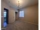 A well-lit carpeted bedroom with open closet and bright natural light from the window at 4252 E Desert Sky Ct, Cave Creek, AZ 85331