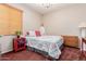 Cozy bedroom with a chandelier, red accent table, and plush carpeting at 4252 E Desert Sky Ct, Cave Creek, AZ 85331