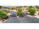 View of community gates with desert landscaping around the entryway at 4252 E Desert Sky Ct, Cave Creek, AZ 85331