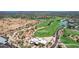 Aerial view of a beautifully maintained golf course with cart paths and manicured greens at 4252 E Desert Sky Ct, Cave Creek, AZ 85331
