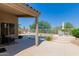 Back patio offering shade and a desert view with furniture and desert landscaping at 4252 E Desert Sky Ct, Cave Creek, AZ 85331