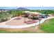 Aerial view of the community playground featuring covered play structures at 4252 E Desert Sky Ct, Cave Creek, AZ 85331