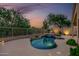 Beautiful desert landscaping surrounds this home's backyard pool and seating area at 4252 E Desert Sky Ct, Cave Creek, AZ 85331