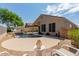 Home features a backyard pool, desert landscaping, and covered patio area at 4252 E Desert Sky Ct, Cave Creek, AZ 85331