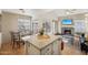 Kitchen and dining area with ample natural light, granite countertops, and stainless steel appliances at 602 N May St # 29, Mesa, AZ 85201