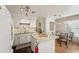Charming kitchen with island open to the dining area, perfect for entertaining at 602 N May St # 29, Mesa, AZ 85201