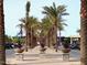 Palm tree lined park entrance showing native landscaping, pedestrian access, and ample parking at 602 N May St # 29, Mesa, AZ 85201