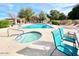 Inviting community pool and spa with ample lounge seating for residents at 602 N May St # 29, Mesa, AZ 85201