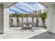 Beautiful outdoor living space with fire pit, decorative tile and manicured landscaping at 6345 N 10Th Dr, Phoenix, AZ 85013