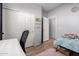 Bedroom with tile floors, closet, interior door and bed at 6461 S Kimberlee Way, Chandler, AZ 85249