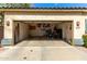 Attached two car garage with ample storage space for tools and equipment at 6461 S Kimberlee Way, Chandler, AZ 85249