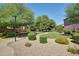 A neighborhood park with lush greenery, walking paths, and a playground for Gathering fun at 6461 S Kimberlee Way, Chandler, AZ 85249