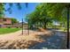 Neighborhood playground includes a playground and a grassy area for children to play at 6461 S Kimberlee Way, Chandler, AZ 85249