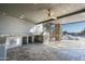 Outdoor kitchen featuring a BBQ area, custom countertops, spiral stairs and an open layout for seamless entertaining at 7025 E Panorama Dr, Cave Creek, AZ 85331