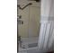 Clean bathtub with showerhead and curtain at 7807 E Main St # F-30, Mesa, AZ 85207