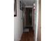 Hallway with practical flooring and access to multiple rooms in the home at 7807 E Main St # F-30, Mesa, AZ 85207