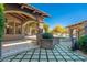 Expansive backyard featuring manicured landscaping, a covered patio, and a pool and spa at 9290 E Thompson Peak Pkwy # 470, Scottsdale, AZ 85255