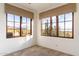 Bright bedroom with large windows, offering beautiful views of the surrounding landscape at 9290 E Thompson Peak Pkwy # 470, Scottsdale, AZ 85255