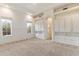 Spacious bedroom with built-in cabinets, carpet floors, recessed lights, and large windows at 9290 E Thompson Peak Pkwy # 470, Scottsdale, AZ 85255