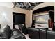 Home theater with plush seating and custom cloud ceiling paint at 9290 E Thompson Peak Pkwy # 470, Scottsdale, AZ 85255