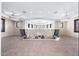 Spacious loft with decorative wrought iron railing overlooking a luxurious living space, providing an elegant and open feel at 9290 E Thompson Peak Pkwy # 470, Scottsdale, AZ 85255