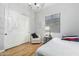 Bedroom with a twin bed, a chandelier, and a sliding door closet at 9295 W Quail Track Dr, Peoria, AZ 85383