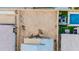 Aerial view showing a large empty lot ready for customization, next to a home with a beautiful pool at 9520 W Trumbull Rd, Tolleson, AZ 85353