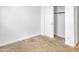 Bedroom featuring carpet flooring and closet at 9520 W Trumbull Rd, Tolleson, AZ 85353