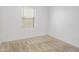 Bright bedroom featuring carpet flooring and a window at 9520 W Trumbull Rd, Tolleson, AZ 85353