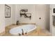 Modern bathroom featuring a soaking tub and step in shower at 10883 E La Junta Rd, Scottsdale, AZ 85255