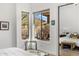 Bedroom offering desert views and a comfortable interior at 10883 E La Junta Rd, Scottsdale, AZ 85255
