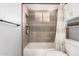 This renovated bathroom features stylish fixtures, a new tub, and modern gray tile at 11333 N 92Nd St # 2028, Scottsdale, AZ 85260