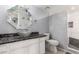 The bathroom features a unique glass bowl sink and granite countertops paired with modern finishes at 11333 N 92Nd St # 2028, Scottsdale, AZ 85260