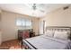 A charming bedroom combines a study area with a cozy sleeping space at 11333 N 92Nd St # 2028, Scottsdale, AZ 85260