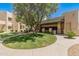 Charming courtyard with a green lawn and mature trees in a well-maintained community at 11333 N 92Nd St # 2028, Scottsdale, AZ 85260