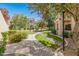 Beautifully landscaped community with lush greenery, flowers, and walking paths at 11333 N 92Nd St # 2028, Scottsdale, AZ 85260