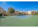 Blue and green tennis court surrounded by the apartment complex at 11333 N 92Nd St # 2028, Scottsdale, AZ 85260