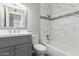 Bathroom includes shower/tub combination with marbled tiles at 1214 N 84Th Pl, Scottsdale, AZ 85257