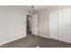 Bedroom with closet, neutral walls, and carpet at 1214 N 84Th Pl, Scottsdale, AZ 85257