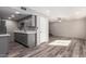 Kitchen features stainless steel appliances, stone countertops, and grey cabinetry at 1214 N 84Th Pl, Scottsdale, AZ 85257