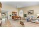 Spacious living area with tile flooring, comfortable sofa, and decorative accents at 1314 E Bluefield Ave, Phoenix, AZ 85022