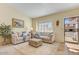 Inviting living room with comfortable seating, natural light, and neutral decor at 1314 E Bluefield Ave, Phoenix, AZ 85022