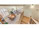 Bright living room with a cozy seating area, dining table and staircase to the second floor at 1314 E Bluefield Ave, Phoenix, AZ 85022