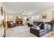 Inviting living room featuring a brick fireplace and comfortable seating at 1314 E Bluefield Ave, Phoenix, AZ 85022