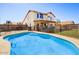 Inviting backyard pool with a security fence, perfect for relaxation and enjoying the outdoors at 1314 E Bluefield Ave, Phoenix, AZ 85022