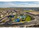 Aerial view of the community pool and recreational areas, showcasing the amenities available to residents at 13568 N 144Th Dr, Surprise, AZ 85379