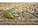 Wide aerial view of the community pool, highlighting its inviting design and surrounding amenities at 13568 N 144Th Dr, Surprise, AZ 85379