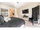 Comfortable main bedroom features stylish furnishings and decor at 13568 N 144Th Dr, Surprise, AZ 85379
