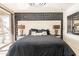 Elegant main bedroom with a luxurious headboard and stylish decor at 13568 N 144Th Dr, Surprise, AZ 85379